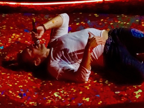 Chris Martin Laying in Confetti Coldplay Rogers Place Edmonton September 27, 2017